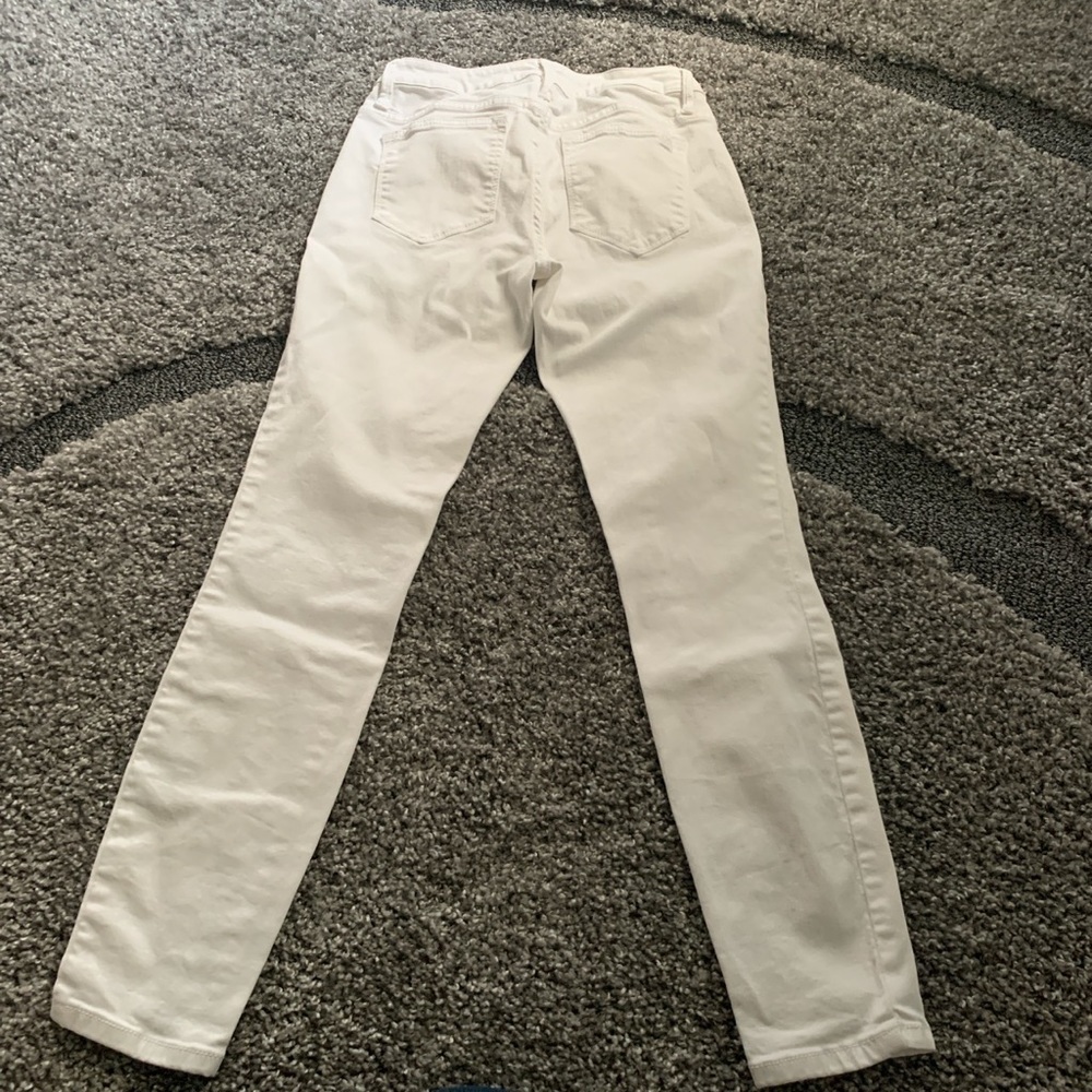 Bebe white skinny jeans